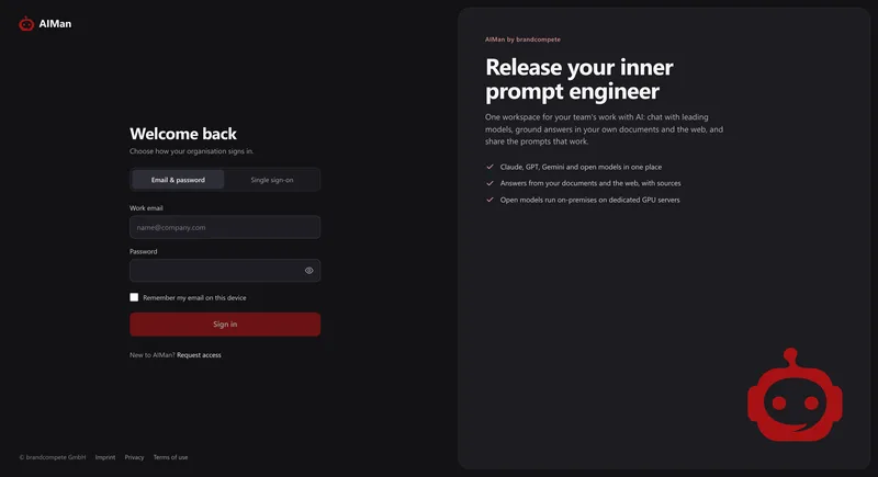 The AIMan sign-in screen on the Email & password tab with fields for work email and password and a Sign in button.